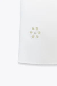 TOP STRETCH BRODERIES FLEURS