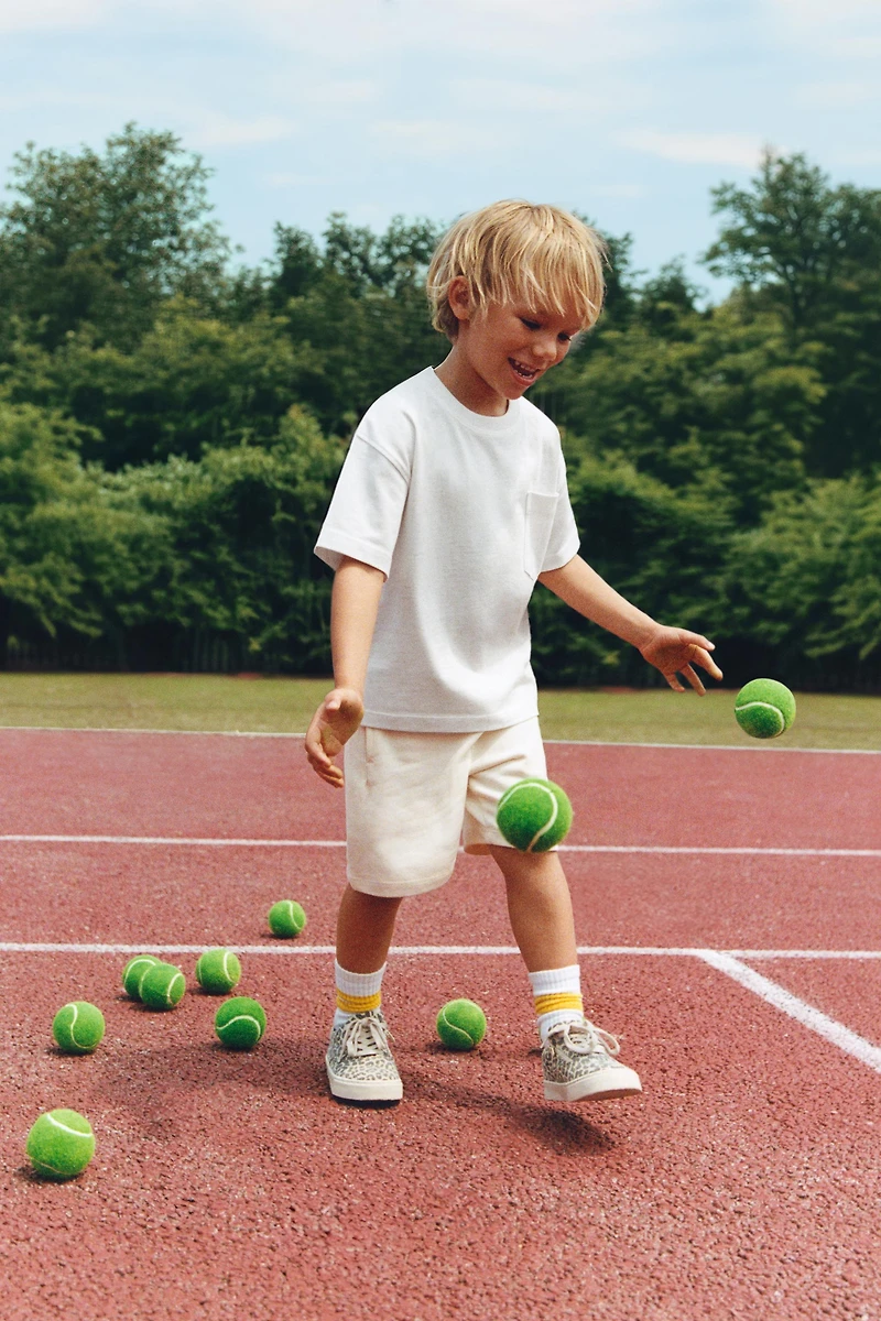 T-SHIRT UNI À POCHE