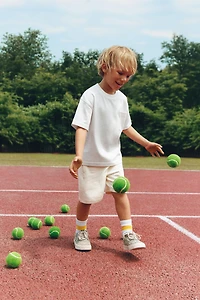 T-SHIRT UNI À POCHE