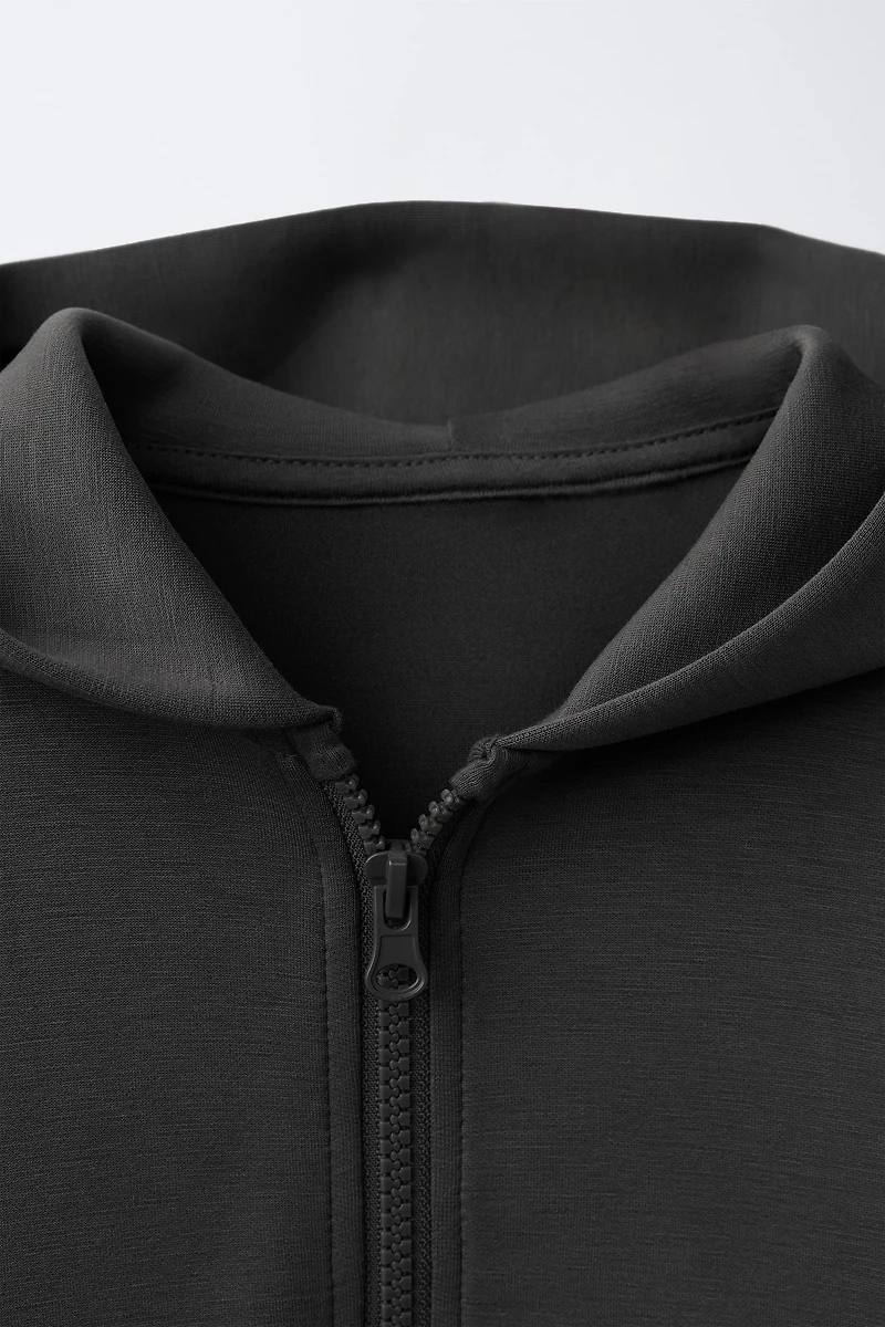 SWEAT ZIPPÉ INTERLOCK