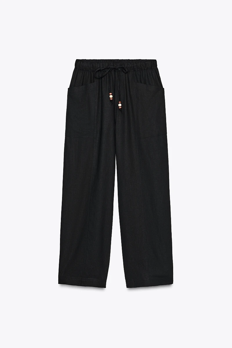 LINEN PANTS WITH BEADED DRAWSTRINGS