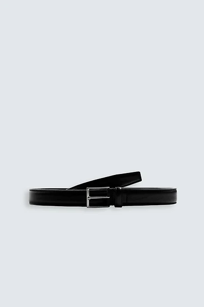 CEINTURE EN CUIR HABILLÉE