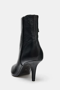 BOTTINES À TALONS EN CUIR