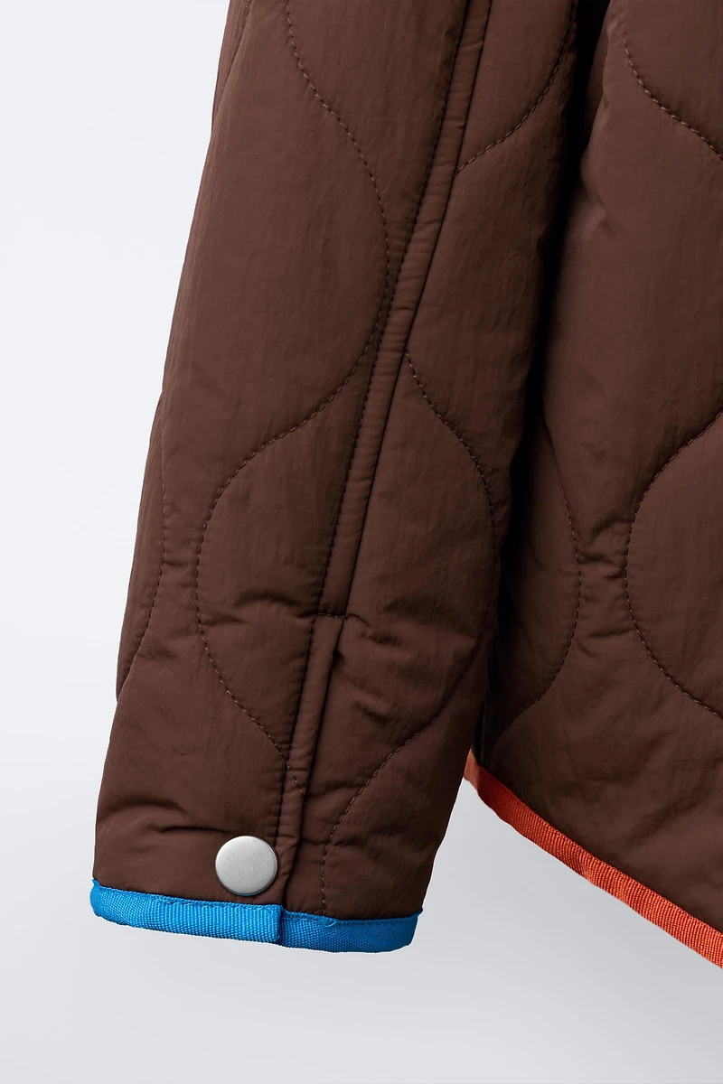 VESTE À DÉTAILS CONTRASTE