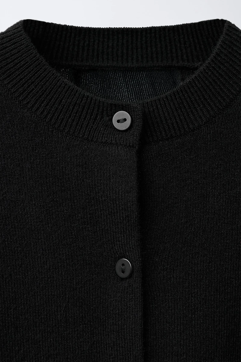 GILET EN MAILLE PLUMES DÉTACHABLES