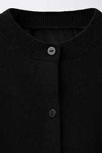 GILET EN MAILLE PLUMES DÉTACHABLES