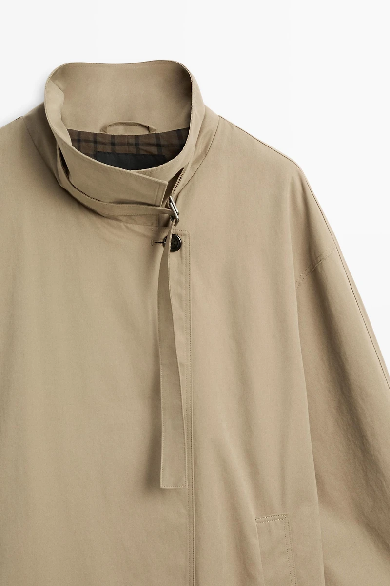 Long trench coat with buckle detail