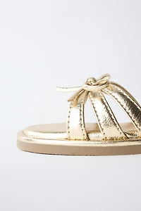 METALLIC BOW SANDALS