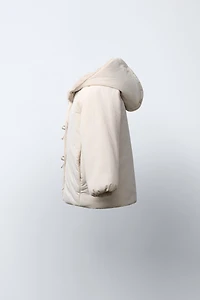 WATER REPELLENT PUFFER COAT WITH BOWS