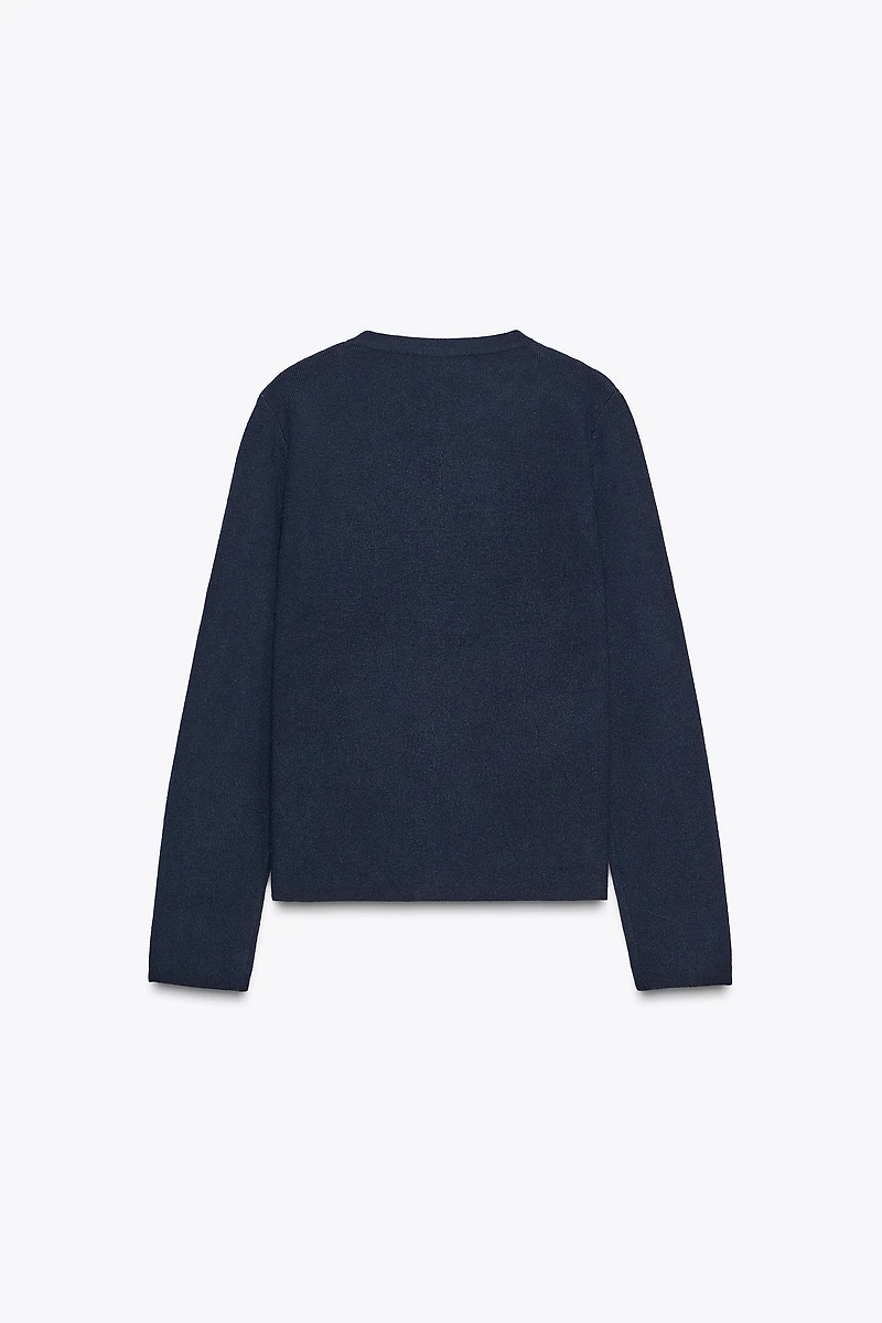 GILET BASIQUE EN MAILLE À BOUTONS