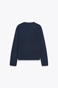 GILET BASIQUE EN MAILLE À BOUTONS