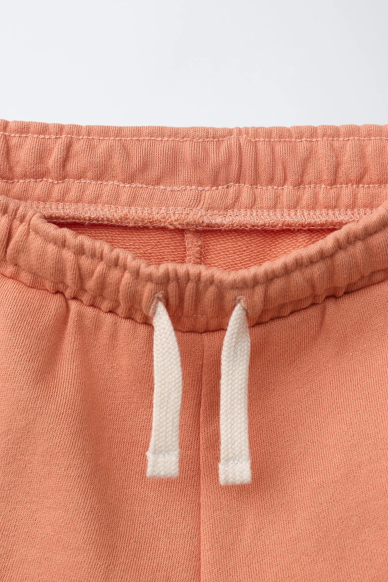 GARMENT DYED LOGO PLUSH SHORTS