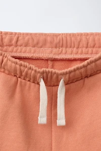 GARMENT DYED LOGO PLUSH SHORTS