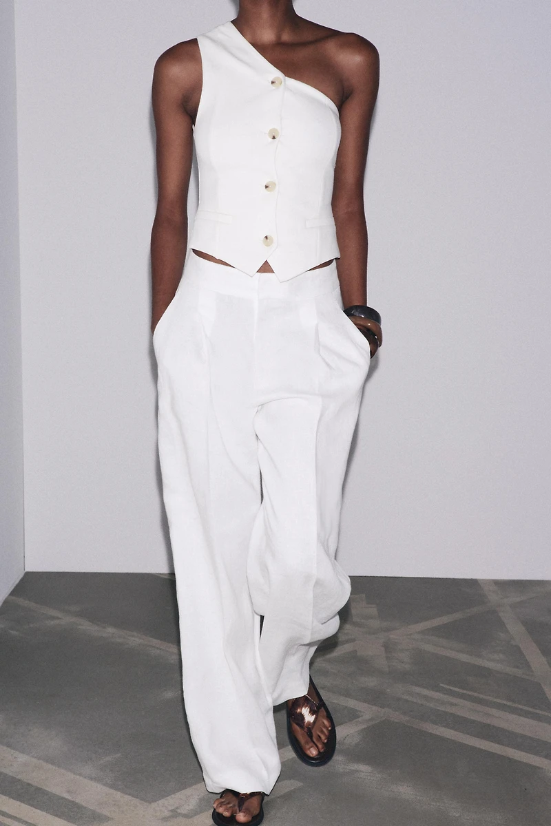 TOP GILET ASYMÉTRIQUE INTERLOCK