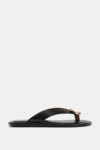 FLAT SANDALS WITH METALLIC DETAIL