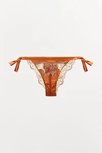 CULOTTE SATINÉ À NŒUDS ET DENTELLE