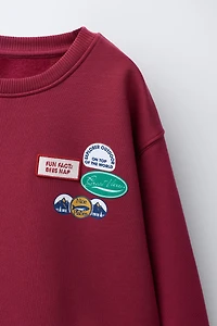 PATCH SWEATSHIRT