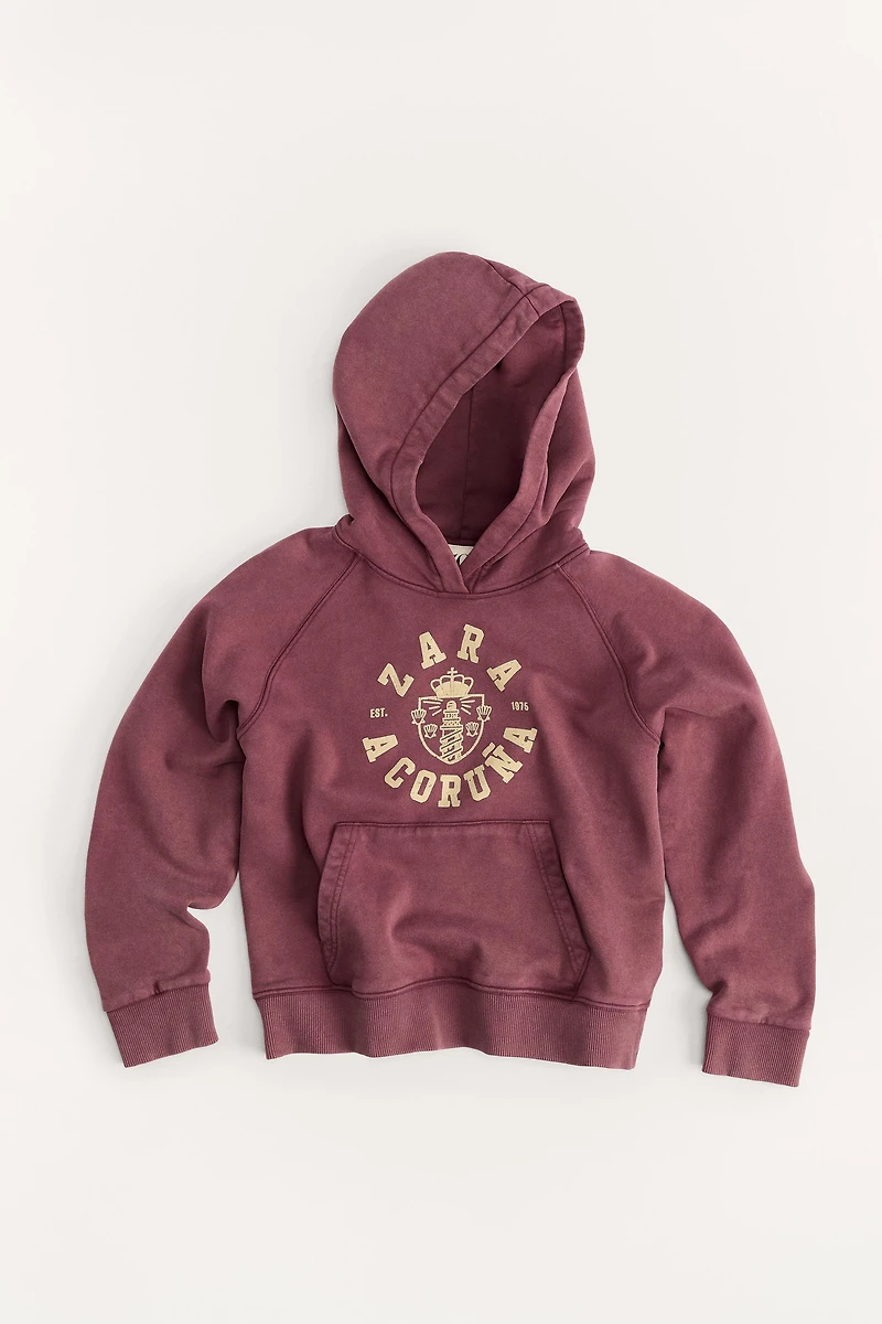 6- ANS/ SWEAT À CAPUCHE VARSITY 50TH ANNIVERSARY