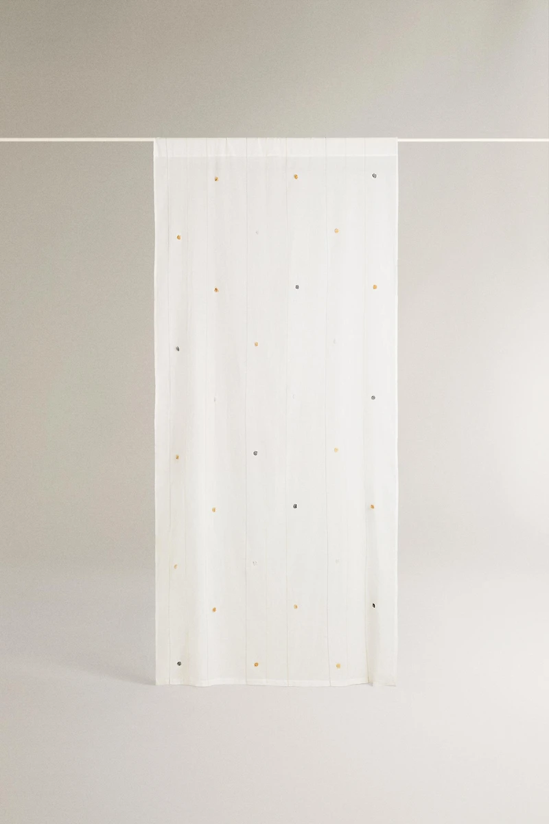 LOW OPACITY TASSEL CURTAIN