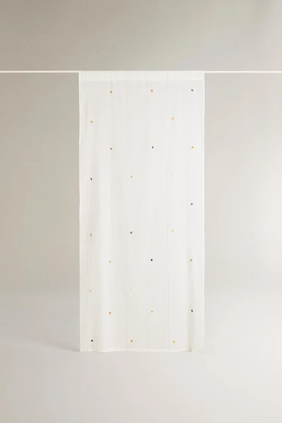 LOW OPACITY TASSEL CURTAIN