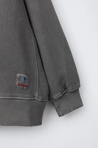 SWEAT TEINT EN PIÈCE ÉTIQUETTE