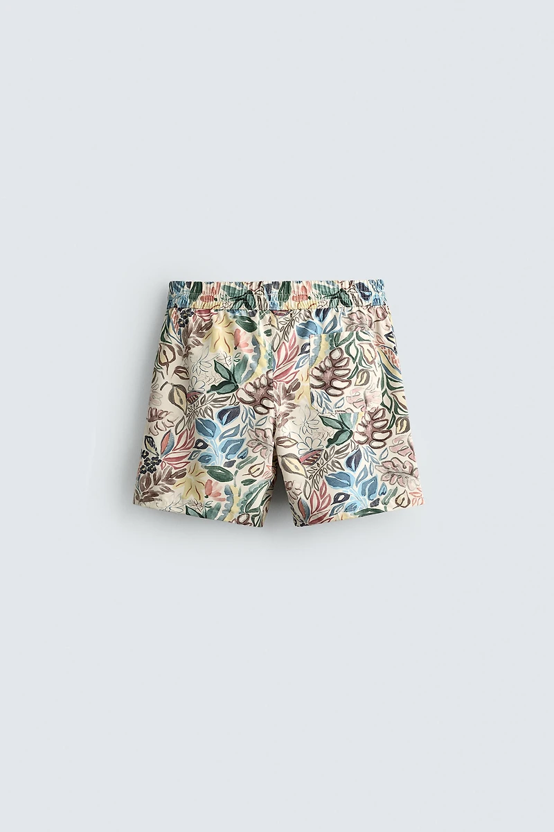 LONG FLORAL PRINT SWIM TRUNKS