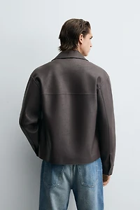 BLOUSON EN MATIÈRE SYNTHÈTIQUE