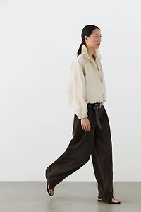 Wide-leg flowing trousers with darts