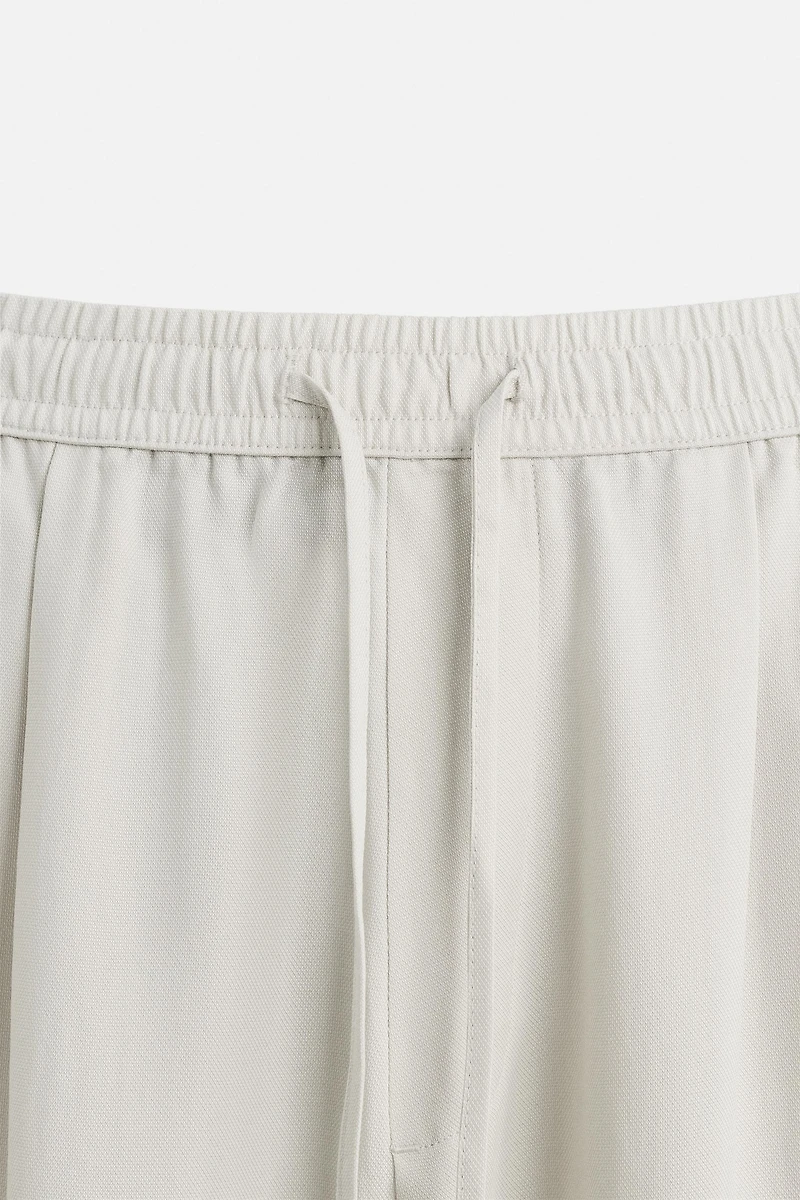 RELAXED FIT FLOWY PANTS