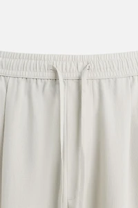 RELAXED FIT FLOWY PANTS