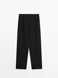 Flowing linen blend trousers with pocket details