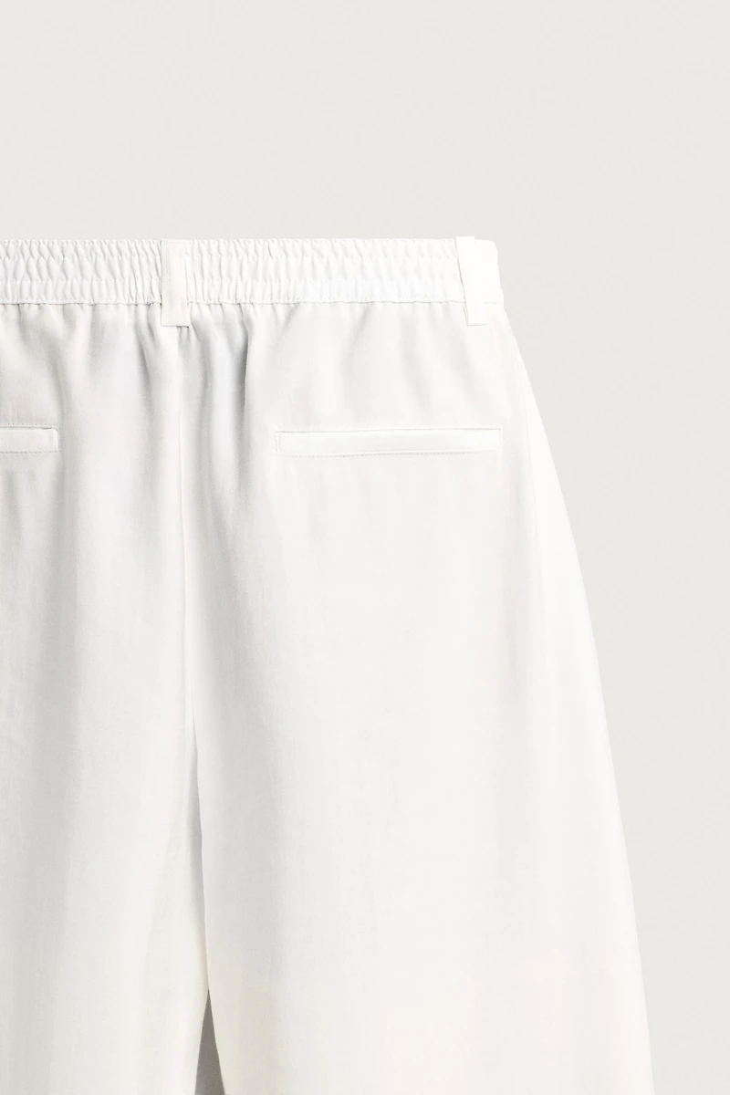PANTALON FLUIDE À PLIS LATÉRAUX