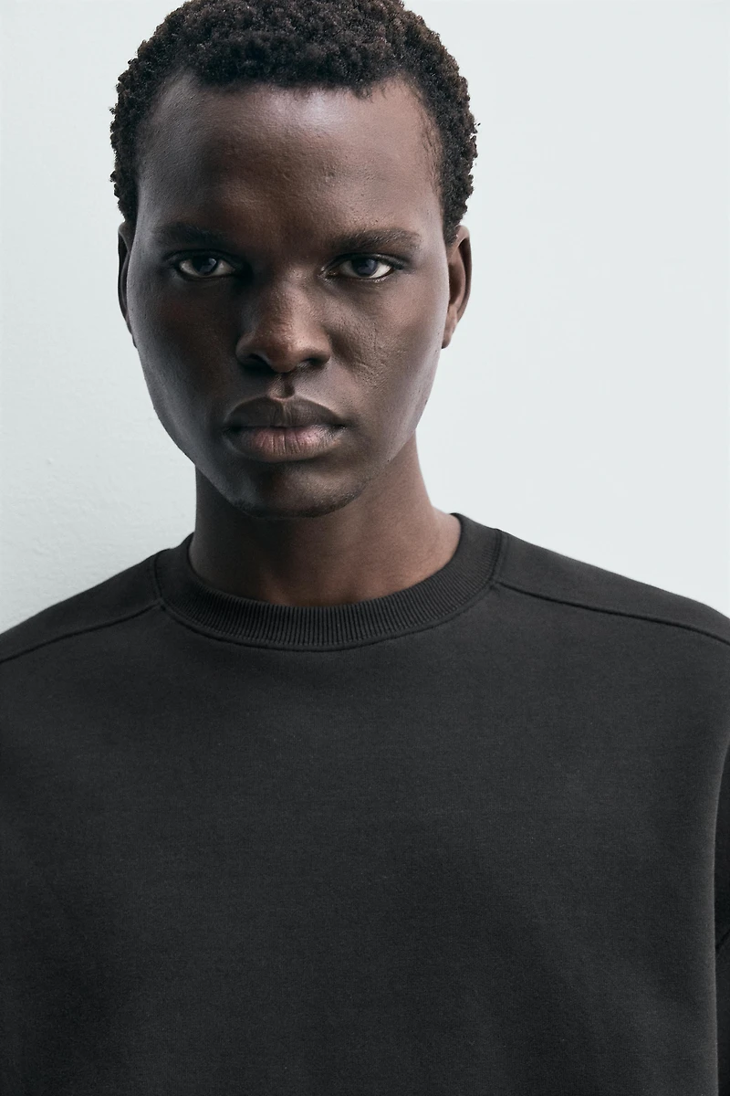RELAXED FIT INTERLOCK SWEATSHIRT