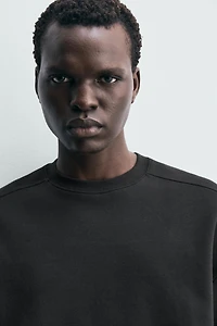 RELAXED FIT INTERLOCK SWEATSHIRT