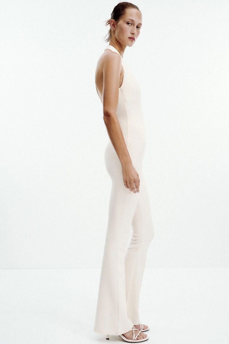 INTERLOCK FLARE JUMPSUIT