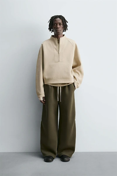 WIDE FIT NEOPRENE EFFECT PANTS WITH STUDS