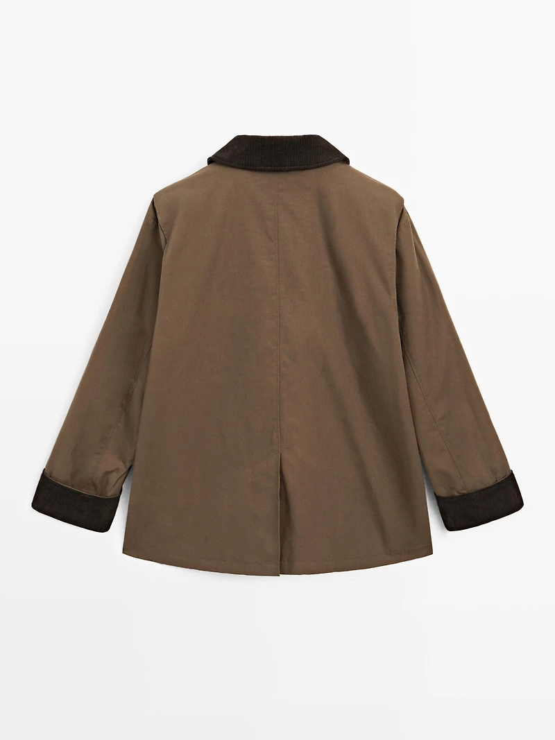 Waxed parka with corduroy detail
