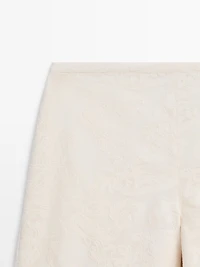 Shorts with fabric detail