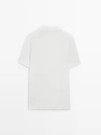 Polo en maille texturée de coton