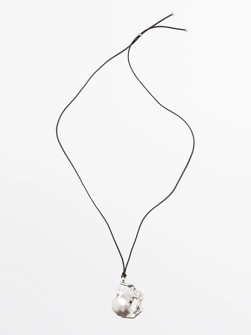 Pendentif pièce abstraite