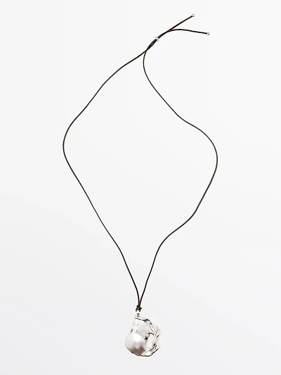 Pendentif pièce abstraite