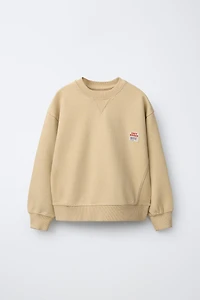 GARMENT DYE LABEL SWEATSHIRT