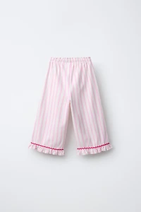 PANTALON À RAYURES TISSÉES ET VOLANTS