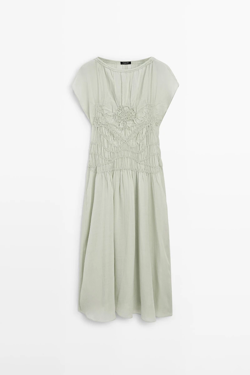 Long flowing dress with embroidered details