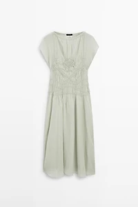 Long flowing dress with embroidered details