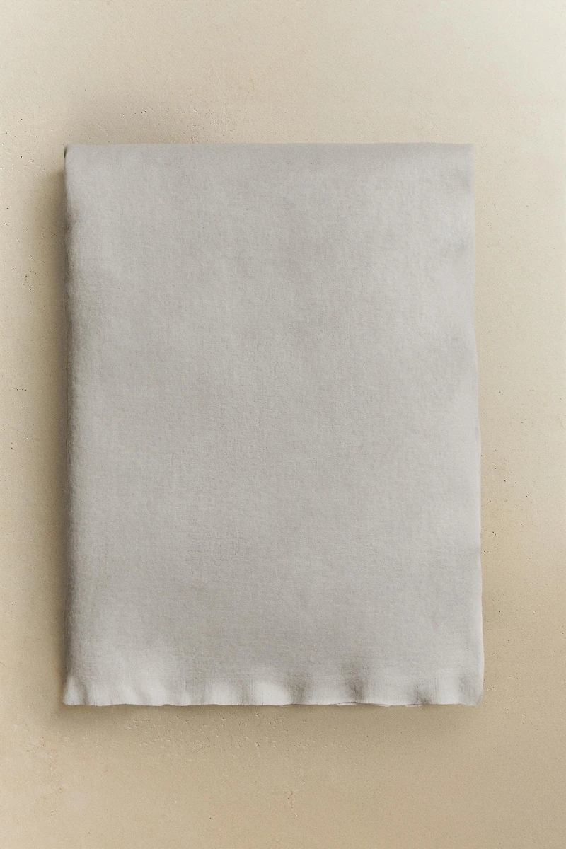 PLAID DOUX À FRANGES