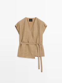 Veste longue cache-cœur sans manches