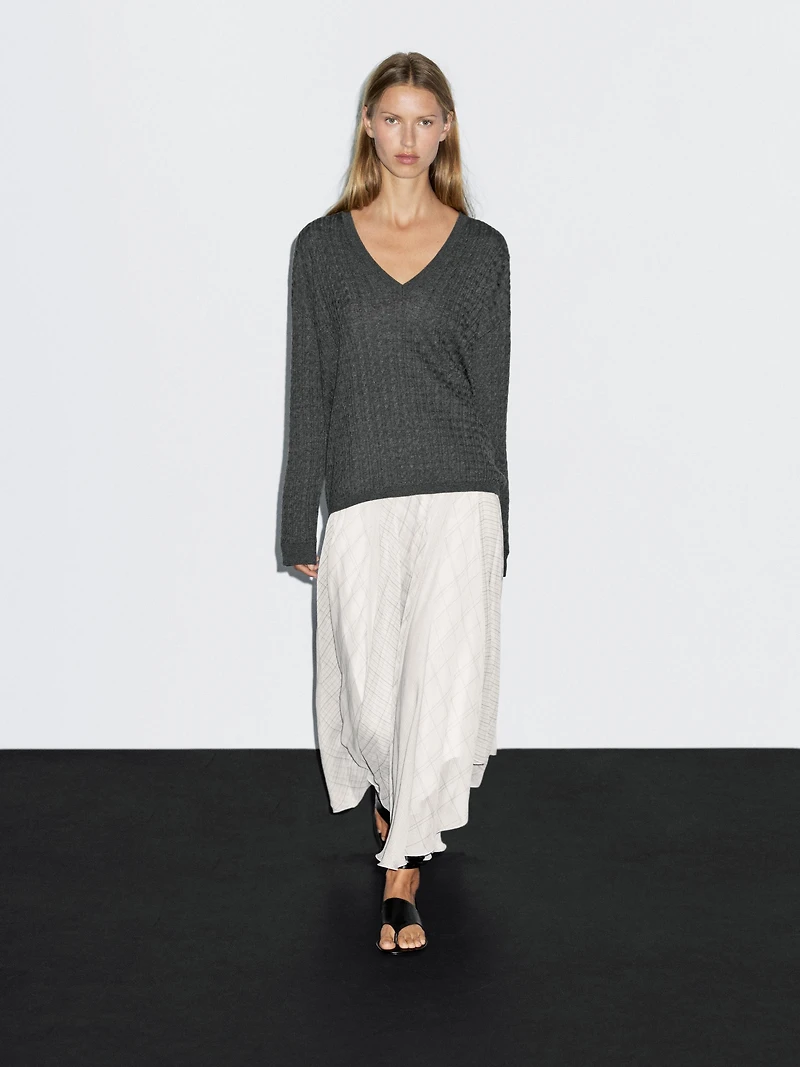 V-neck cable-knit sweater