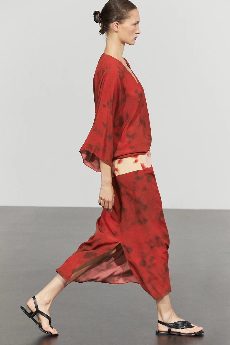 Printed flowing dress with sash detail