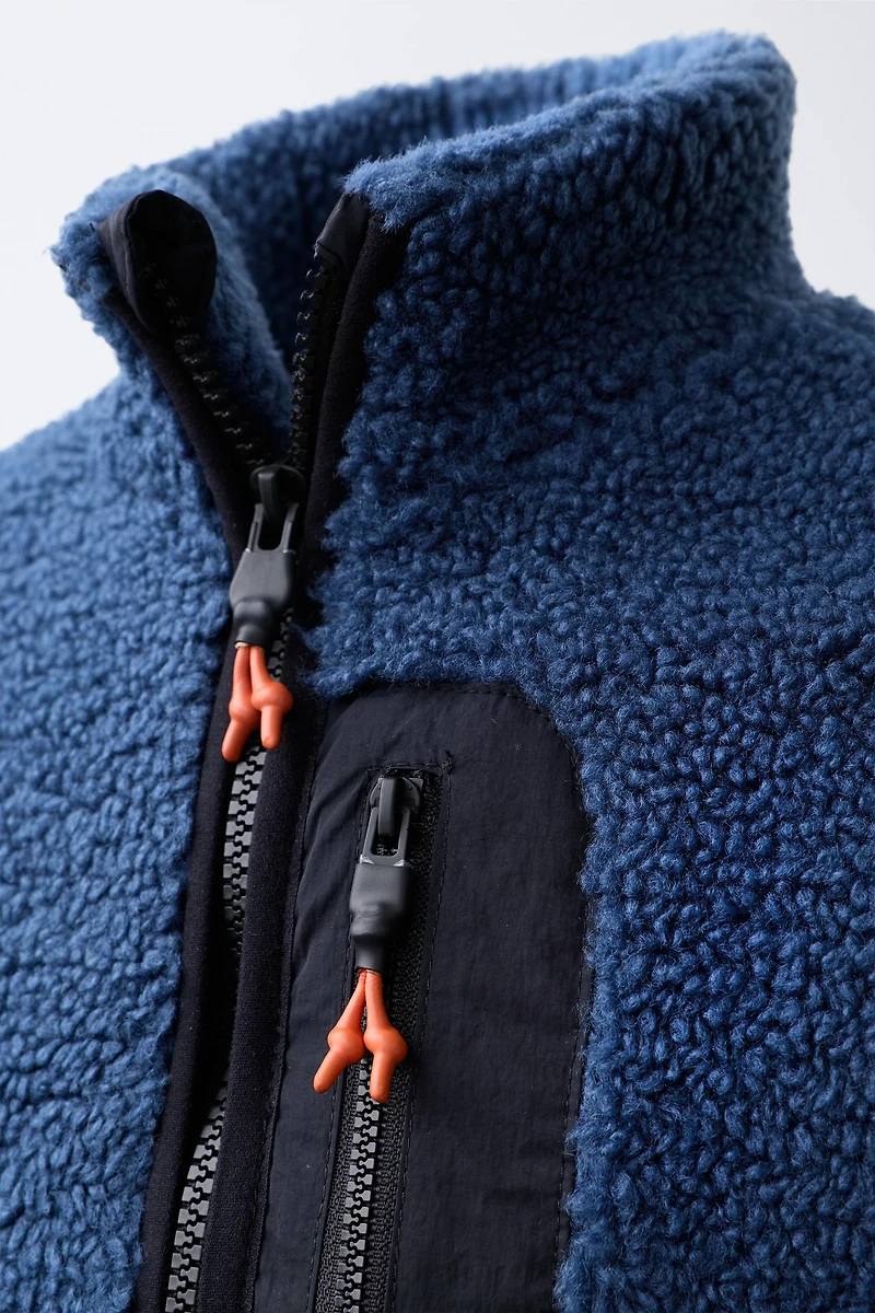 CONTRASTING FAUX SHEARLING VEST